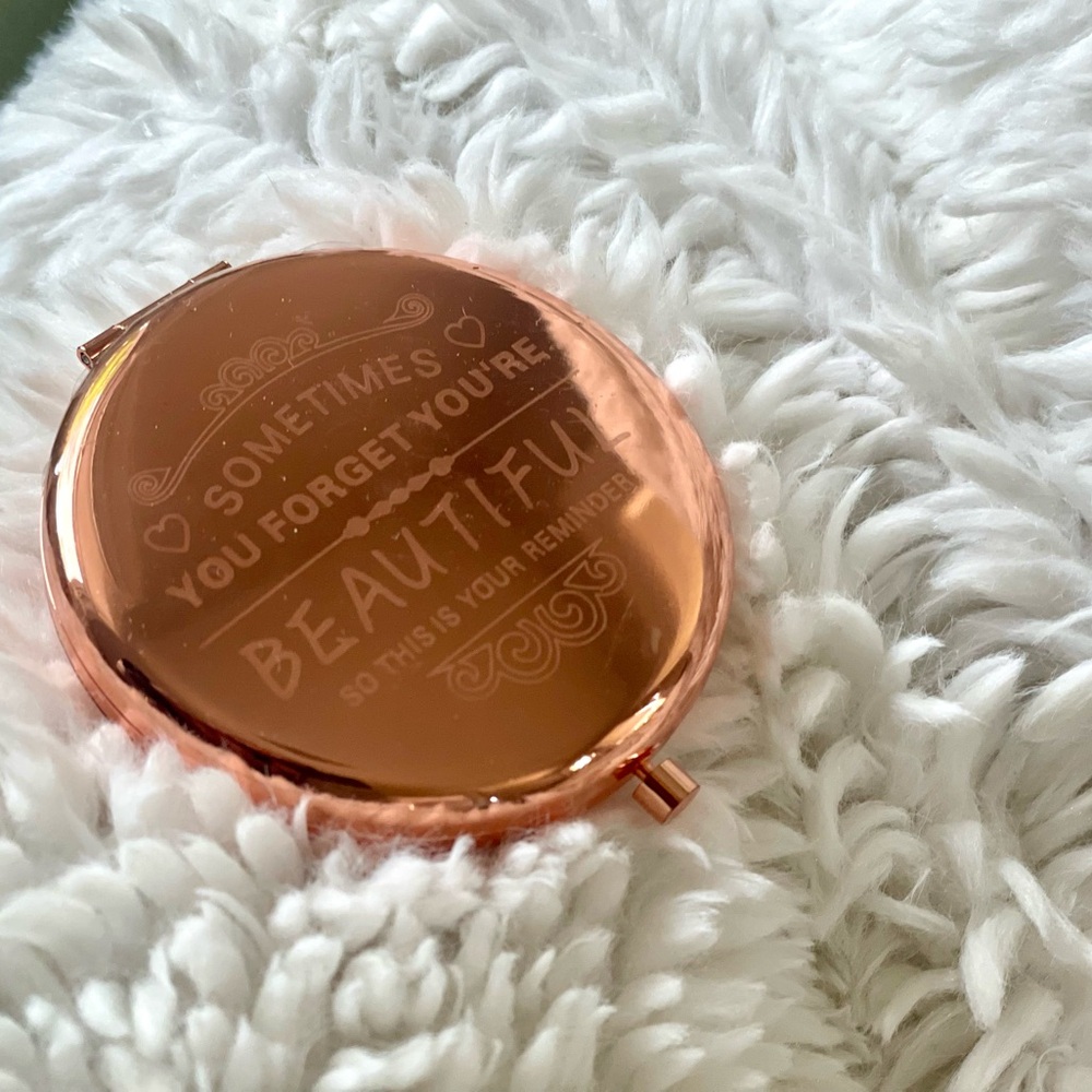 Engraved compact mirror